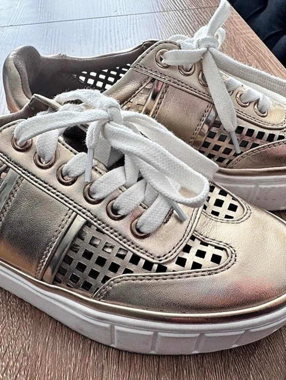Vince Camuto Perforated Sneakers in Gold size 6